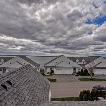 Rooflines and garages along the waterfront row