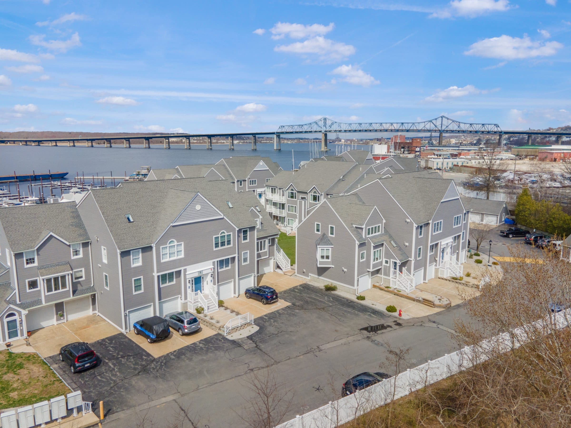 The waterfront row, with the Braga Bridge and the Fall River shore behind